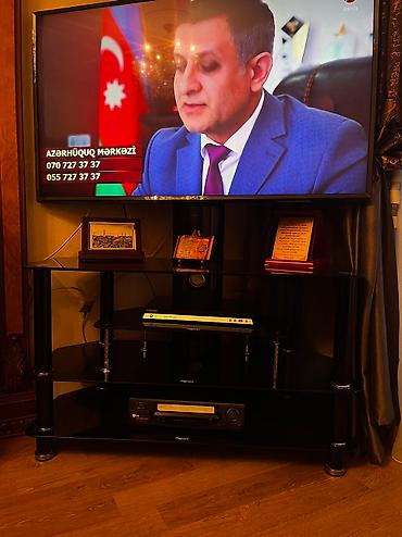 TV altlığı: Televizor altlığı satılır. Yaxşı vəziyyətdədi. Televizor üstünə — 2