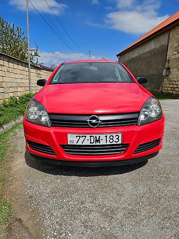 Opel: Opel Astra H hatchback – parlaq qırmızı rəngdə, 5 qapı. Texniki — 5