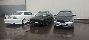 скайлайн: Классический седан BMW E30, известный своей прочной конструкцией и — 1