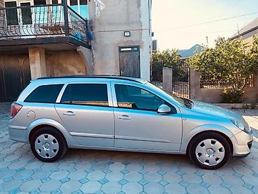 opel astra qiyməti: Opel Astra Caravan (Universal) – gümüşü rəng Texniki xüsusiyyətlər və — 3