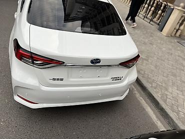 продажа гибридных автомобилей: Toyota Corolla: 2023 г., 1.8 л, Вариатор, Гибрид, Седан — 10