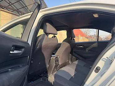 byd e2: Toyota Corolla: 2021 г., 1.8 л, Вариатор, Гибрид, Седан — 7