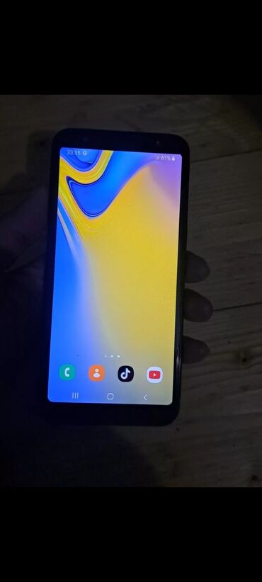 samsung j6: Samsung Galaxy J6 Plus, 32 GB, rəng - Qara, Face ID, İki sim kartlı, Barmaq izi