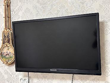комтер: Телевизор Skyworth, диагональ около 32" (ориентировочно). Плоская — 1