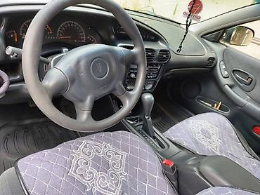 газ 69: Pontiac Grand Prix: 2001 г., 3.1 л, Автомат, Газ, Седан — 4