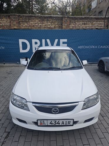 арзан авто машина: Mazda Familia: 2003 г., 1.5 л, Автомат, Бензин, Седан