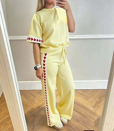 Gornji i donji deo: Ženski komplet trenerke – majica + široke pantalone - Model — 7