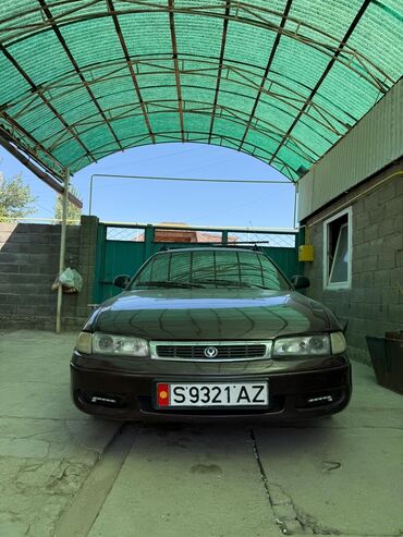 мазда фамил: Mazda Cronos: 1992 г., 1.8 л, Механика, Бензин, Хэтчбэк