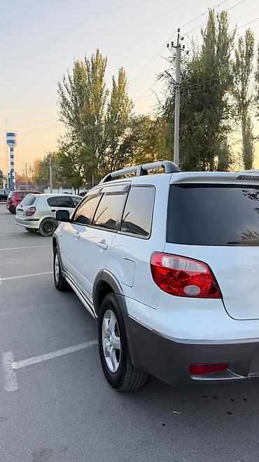 lancer 9: Mitsubishi Outlander: 2004 г., 2.4 л, Автомат, Газ, Кроссовер — 4