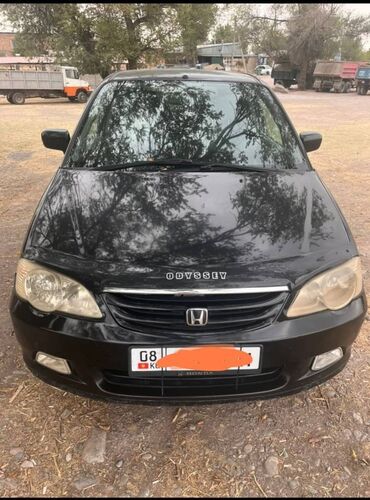 машиналар: Honda Odyssey: 2000 г.
