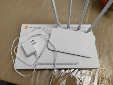 işlənmiş maşın kalonkaları: Xiaomi 4c Router 
Demek olarki islenmeyib