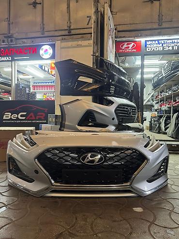Передний бампер в сборе для Hyundai (с фирменной решеткой радиатора и