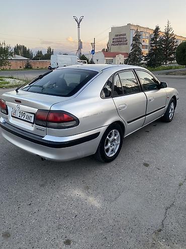 ск шерой: Mazda Capella: 1998 г., 1.8 л, Механика, Бензин, Хэтчбэк — 6
