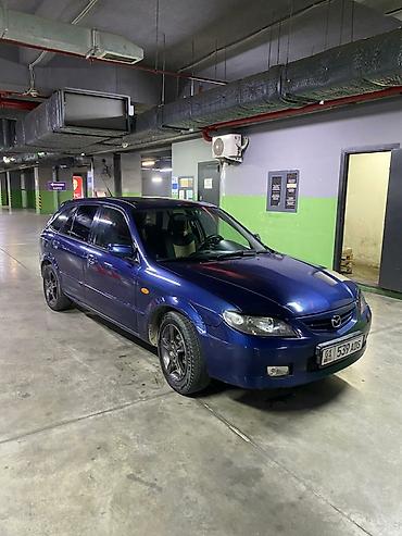 familia: Mazda Familia: 2000 г., Механика, Бензин, Хэтчбэк — 8