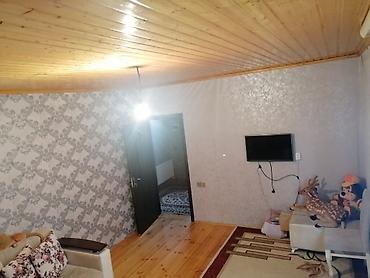 sumqayıtda: Sumqayıt şəh., 2 sotun içində, ü/s təxmini 90 kv.m olan, 2 otaqlı - — 1