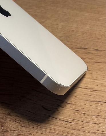 скол: IPhone 13 128GB Состояние на фото АКБ 83% Ключевые характеристики: - — 2
