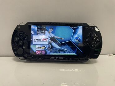 sony psp: PSP 1004 İdeal vəziyyətdədi. Proşivka olunub, yaddaşında 40dan çox PSP