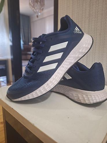 iş patinkası: Orginal Adidas idman ayaqqabısı. Tünd göy rəngdədir, yan hissəsində ağ — 1