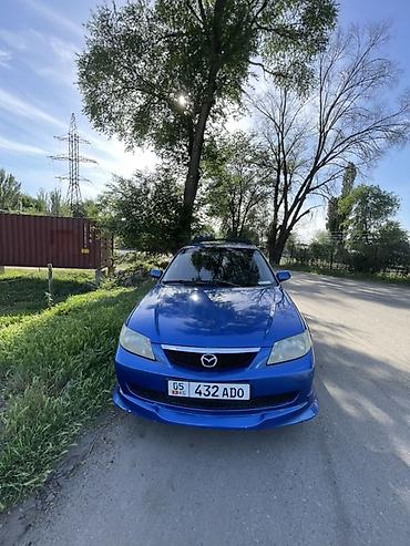 sprinter 4 4: Mazda 323: 2002 г., 1.6 л, Механика, Бензин, Хэтчбэк — 4