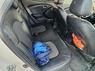 парковочная автовизитка: Hyundai Tucson: 2010 г., 2 л, Автомат, Дизель, Кроссовер — 5