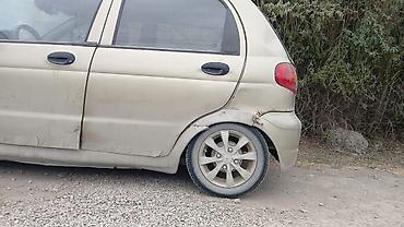Унаа: Daewoo Matiz: 2009 г., 0.8 л, Кол менен иштөөчү, Бензин, Хетчбек — 4