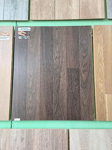 Laminat döşəmə paneli – qəhvəyi/qoz ağacı fakturalı - Material lalafo.az -da Laminat döşəmə paneli – qəhvəyi/qoz ağacı fakturalı - Material