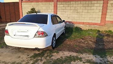 рул: Mitsubishi Lancer: 2006 г., 1.6 л, Автомат, Бензин, Седан — 4