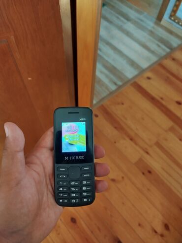 телефон fly nimbus 9: M-Horse brendinin bu qara rəngli düyməli mobil telefonu istifadə üçün