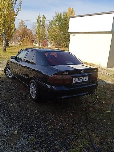 Унаа: Mazda 626: 2000 г., 0.2 - engine capacity л, Кол менен иштөөчү, Бензин, Седан — 2