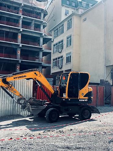 jcb 3cx: Аренда колесного экскаватора Hyundai 60W-5 - Компактный колесный — 2