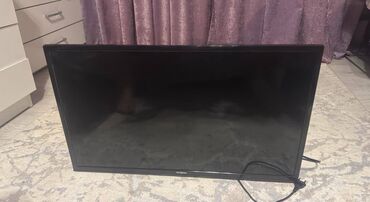 домашняя видеокамера: Телевизор VasiN LED-GF1900 с черным корпусом и плоским экраном. Эта