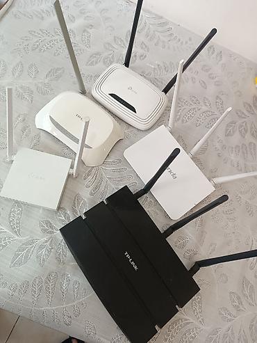 ucuz wifi modem: Wi‑Fi routerlər toplusu Brendlər: TP‑Link və Tenda. Korpusda müxtəlif — 4