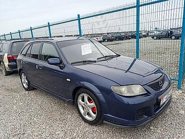 Mazda: Mazda 323: 2002 г., 1.6 л, Механика, Бензин, Хэтчбэк — 13