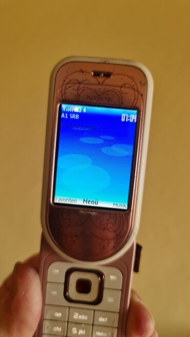 Nokia: Nokia 7373, bоја - Roze, Na preklapanje — 7