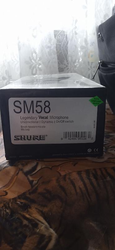 yaxa mikrofon: Shure SM58 dinamik vokal mikrofonu – əfsanəvi kardioid yönlü nümunə — 4