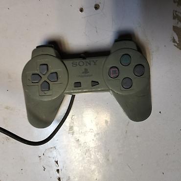 Видеоигры и приставки: Məhsul: Sony PlayStation orijinal simli oyun pultu (PS1) — 1