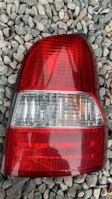 Передние фары: Передняя левая фара Mazda 2002 г., Б/у, Оригинал