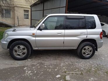 mitsubishi pajero бензин: Mitsubishi Pajero Junior: 2001 г., 2 л, Автомат, Бензин, Внедорожник