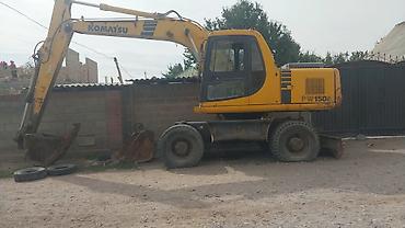 komatsu: Экскаватор, Komatsu, 2004 г., Колесный — 4