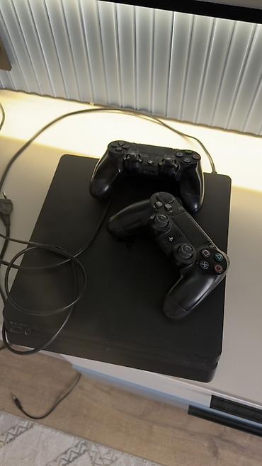 ps4 ош: Игровая консоль Sony PlayStation 4 Slim (черная) Комплектация: - — 1