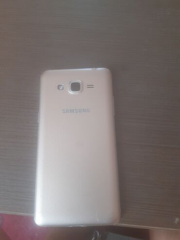 samsung a2: Samsung J210, цвет - Золотой, Сенсорный