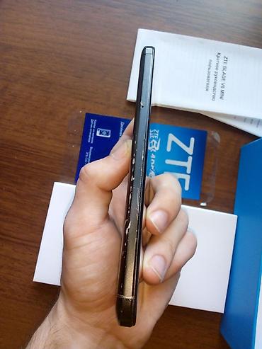 Мобильные телефоны и аксессуары: ZTE Blade V8 Mini, 32 ГБ, цвет - Черный, С документами — 7
