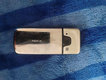 Nokia 6700 Slide, Б/у, < 2 ГБ, цвет - Серебристый, 1 SIM