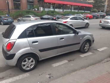 kia optima kredit: Kia Rio: 1.4 l | 2009 il Hetçbek