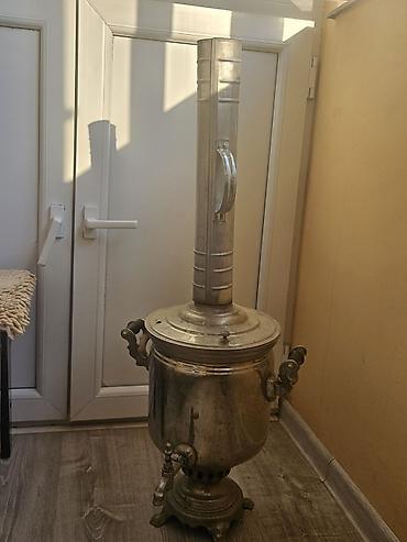 samovar tarixi: Kömür/odunla işləyən metal samovar. 3-4 dəfə işlənib. 5 litr su — 1