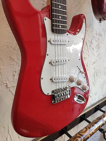 Gitaralar: Elektro gitara Smiger L-G1-ST-RD Üst: Cökə ağacı Qol: Gül ağacı — 3