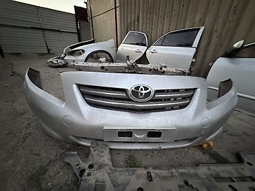 Защита радиатора: Разбор Toyota Corolla (E140/E150), седан, серебристый цвет. В наличии — 20