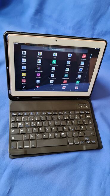 Tableti: Tablet nov skoro veliki 10 inca,bez mane,ima za 2 sim kartice, ide sa — 2