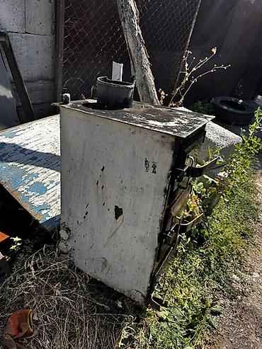 поддув: Металлическая печь-буржуйка с вертикальным корпусом - Топка — 4