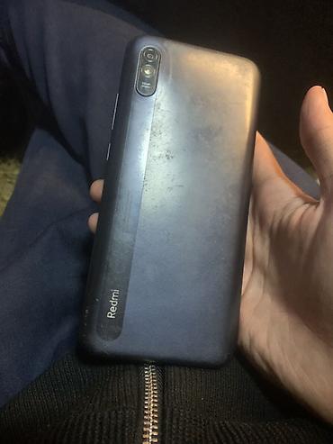 poco c51: Смартфон Xiaomi Redmi 9A. На фото видно: - модель устройства: Redmi — 2